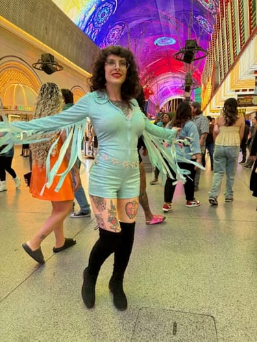 Customer photo review of Glitter Fringe Romper in Sky Blue