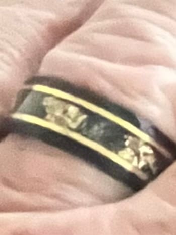Close-up: Customer wearing the Titanfall ring, showing the gold flake and meteorite inlay on their finger.