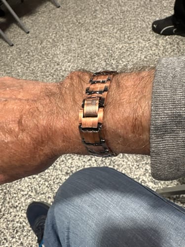 Reviewer wearing the linked Vitalis Copper Magnetic Bracelet on their wrist.
