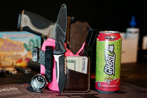 Customer's everyday carry display showing a handgun in a pink holster which uses a T1C individual wedge.