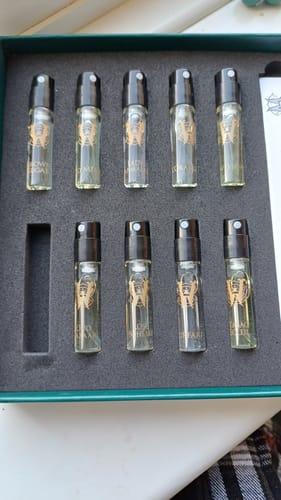 Customer's opened Discovery Set showing nine sample vials in a foam insert, with one empty space.
