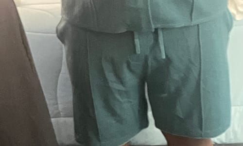 Close-up: Reviewer wearing the textured green Rilssasto Cabana Short as part of a matching set.