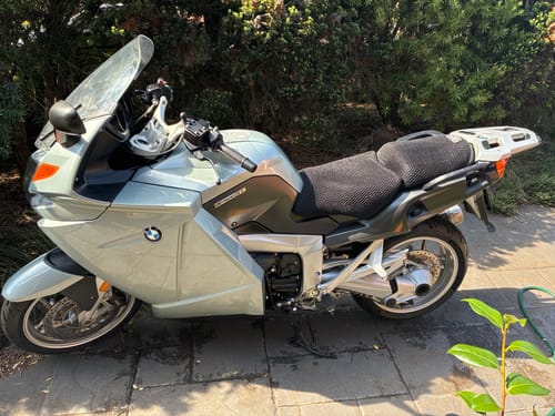 Customer's Wind Rider Seat Cover installed on their silver BMW K1200 GT motorcycle.