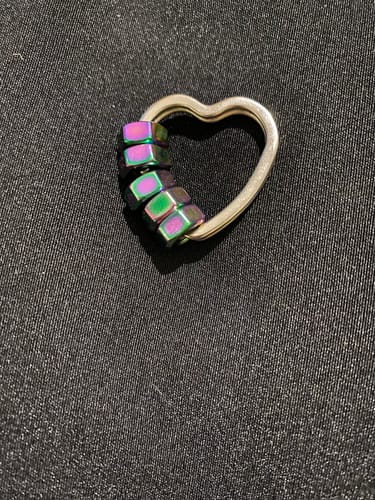 Customer photo review of Oil Slick Heart Hexa XL Fidget