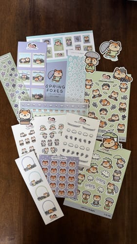 Reviewer's complete Spring Foxes Sticker Set, showing various colorful sticker sheets and die-cut foxes.