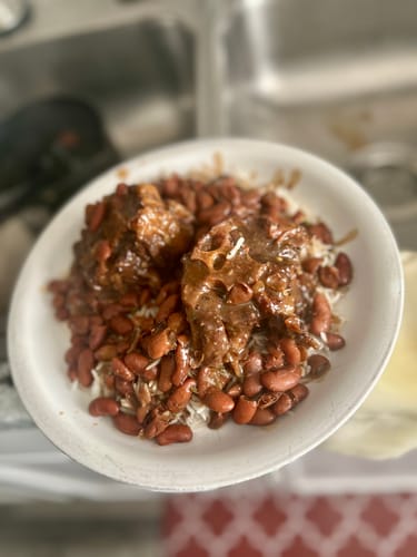 Customer's hearty Halal Beef Oxtail stew with red kidney beans, served over rice.