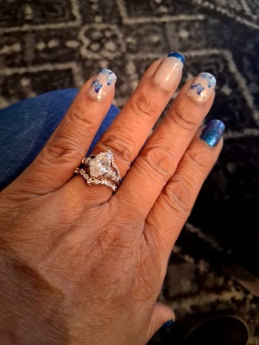 Customer photo review of Three Stone Marquise-Cut Moissanite Tapered Baguette Engagement Ring