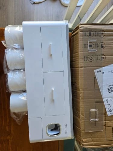 Customer photo review of Automatic Wall Mount Toothpaste Dispenser