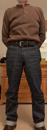 Reviewer wearing the black Legend Double Prong Retro Style belt with dark wash jeans and a brown shirt.