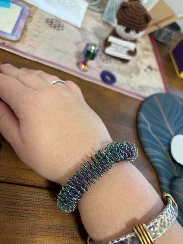 Customer photo review of Wrist Spikey - OIL SLICK