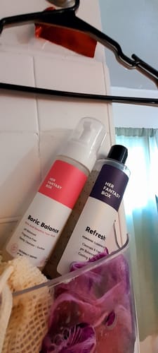 Customer's Boric Balance foam wash with a pink label, shown in a clear shower caddy next to another product.
