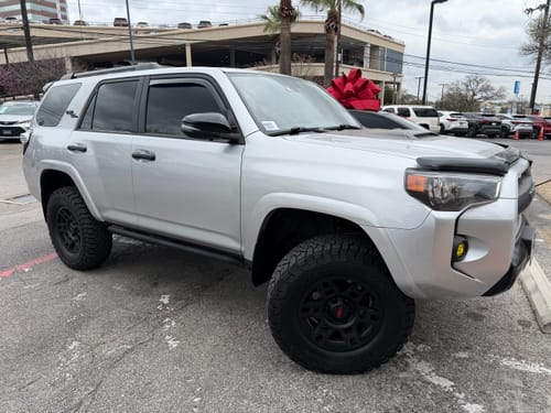 Customer's silver Toyota 4Runner, shown before the installation of the new control arms.