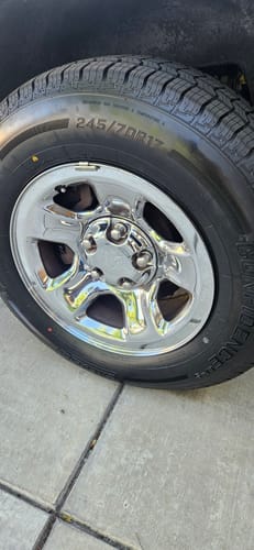 Customer's shiny chrome wheel is clean and reflective after using Absolute Acid.