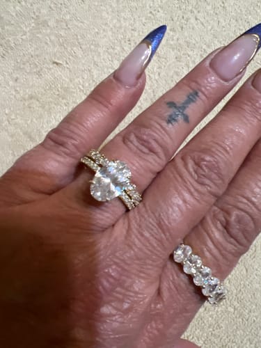 Customer photo review of 4.0Ct Oval Cut Yellow Gold Engagement Ring with Marquise & Round Wedding Band