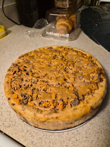 Customer photo review of Peanut Butter Butterfinger Cheesecake