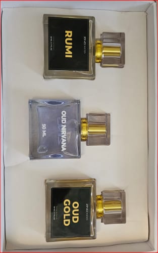 Customer's Khushboo-e-Ramzan set showing the Rumi, Oud Nirvana, and Oud Gold fragrance bottles arranged in their white box.