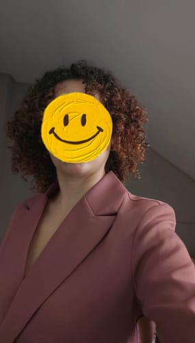 Recensent met gedefinieerde, veerkrachtige krullen na gebruik van de Bounce Curl Hydra-Lite Styling Cream.