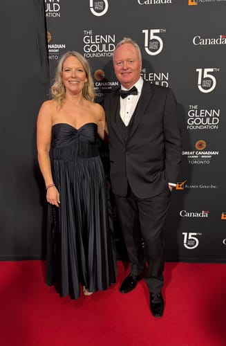 Customer photo review of Belle Pleated Strapless Dress in Navy by AMUR - RENTAL