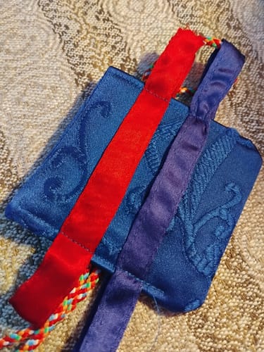 Customer photo review of Amulette Tibétaine Sungkhor Dorje Dermo - Attire hommes et femmes.