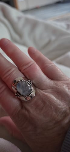 Customer's hand wearing the large oval Boho Moonstone Sterling Silver Ring.