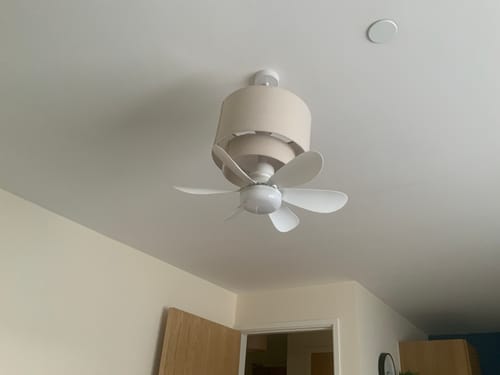 Customer's 2-in-1 Portable Ceiling Fan & Light installed inside an existing light fixture on a ceiling.