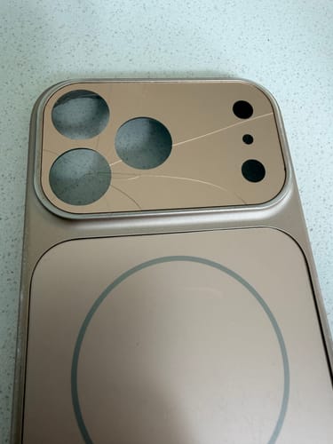 Customer's MagCase Slim phone case with the camera protector cracked after a fall.