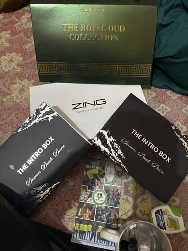 Customer's OUD Supreme BUNDLE and other items, featuring 'The Royal Oud Collection' and 'The Intro Box' packaging.