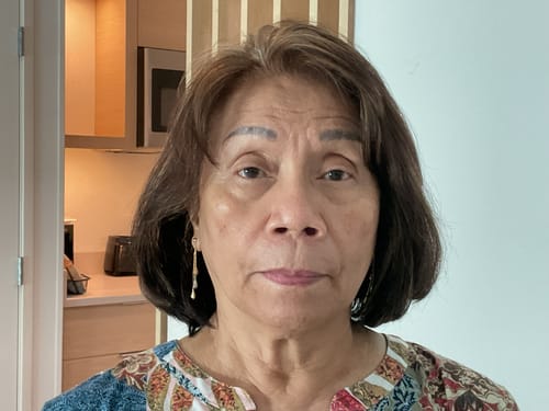 Customer photo showing a person's face, submitted with their product review.