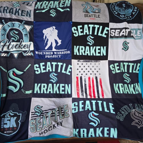 Customer's Project Repat T-Shirt Quilt made with Seattle Kraken hockey and Wounded Warrior Project shirts.