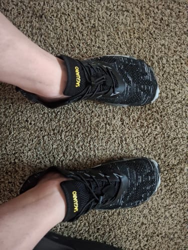 Reviewer's overhead view of their feet in black patterned Smart II - Barefoot Shoes.