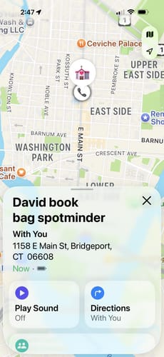 Reviewer's phone screen showing the location of their SPOTMINDERS Tracking Card on a map using the Find My app.