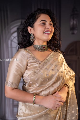 Customer photo review of Ivory Gold Saree with Heavy Zari Pallu & Ethnic Butta Design