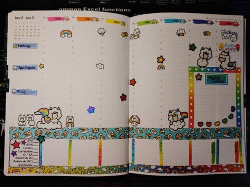 Customer's weekly planner decorated with colorful llama and rainbow stickers from the Ultimate Subscription box.