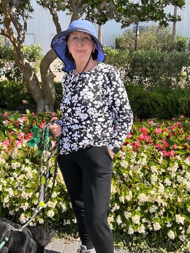 Reviewer standing outdoors showing the comfortable fit of the black Madden Joggers.