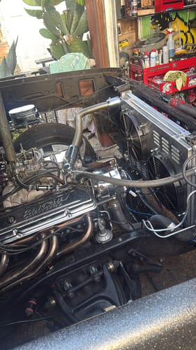 Customer's new Exhaust Header installed in the engine bay of a 1978 Chevy C10 with a 350 motor.