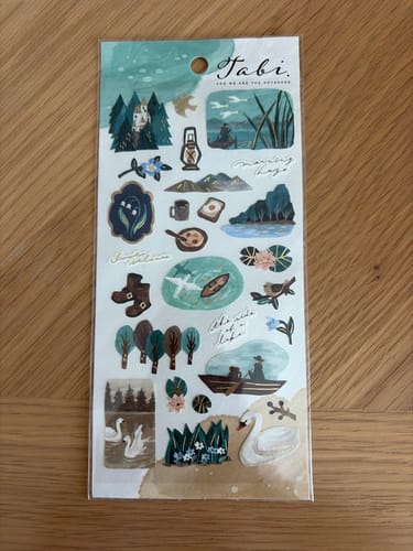 Customer's sheet of Mind Wave Tabi Stickers with beautiful lakeside designs and gold foil accents.