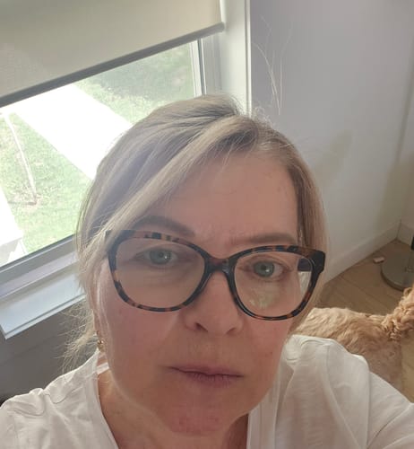 Reviewer showing their smooth, glowing skin after using F-Balm Tallow Balm.