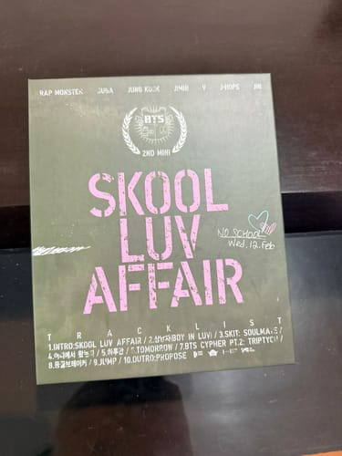 Customer's BTS 2nd Mini Album Skool Luv Affair, showing the green cover with pink text.