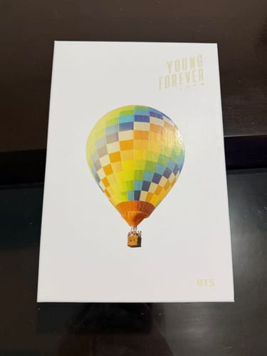 Customer's photo of the BTS Young Forever album, Day version, with its colorful hot air balloon cover.