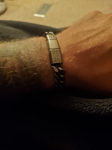 Customer wearing the Knights Templar bracelet, with a close-up showing the engraved stainless steel clasp.