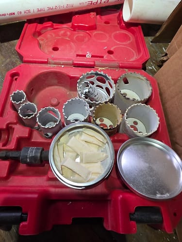 A customer's open can of HYPPE Moist Pouches, seen in a red tool kit.
