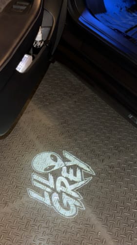 Customer photo review of Custom LED Courtesy Door Projector Puddle Lights For Tesla Model 3 - 2017-2023