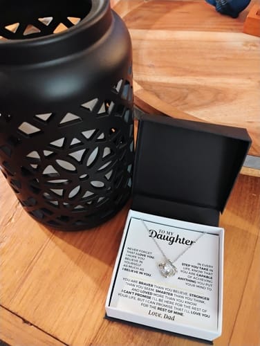 Reviewer's beautiful 'To My Daughter' gift set with the love knot necklace and message card in its open box.
