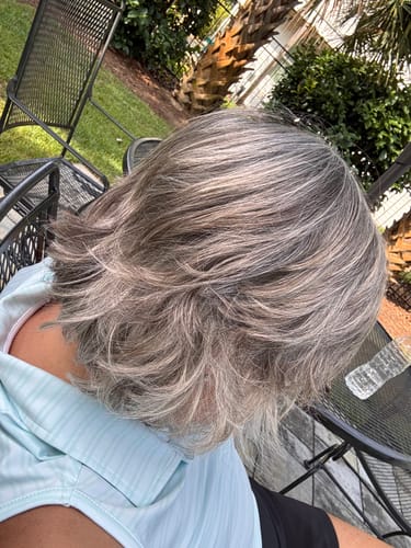 Reviewer's wavy, textured chin-length hair after using the Ocean Hair Texture Treatment.