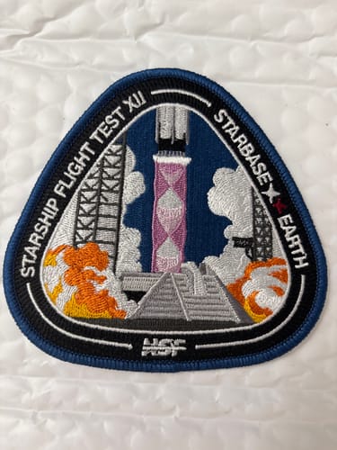 Customer's embroidered Starship Flight 12 Collectors Patch, featuring a detailed rocket launch scene on a white background.