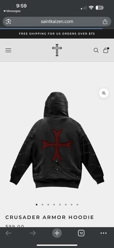 Customer's review showing the back of the black Crusader Armor Hoodie with a large red cross and studded sleeves.