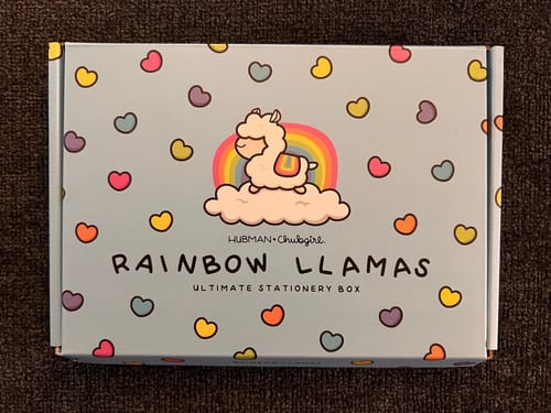 Packaging for the customer's Ultimate Subscription, featuring a colorful "Rainbow Llamas" theme.