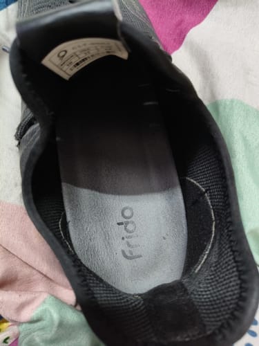 Customer's top-down view of the Frido Dual Gel Insole fitted inside a black shoe.