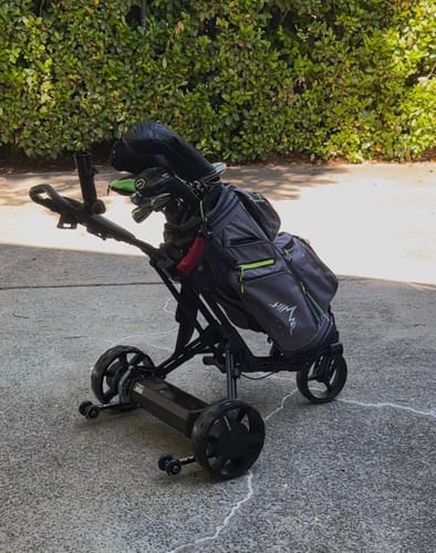 Customer's V2Pro + Omni Cart with a golf bag, shown with the reviewer's added organizer and cell phone holder.
