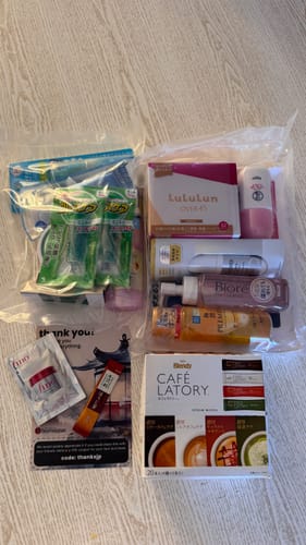 Customer's box of AGF Blendy Sticks Coffee Latory shown with many other products from an order.
